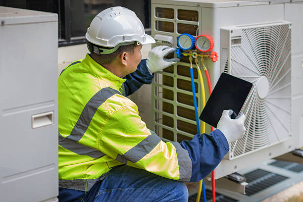 Professional Air Conditioning Repair technician working in Trumbauersville, PA